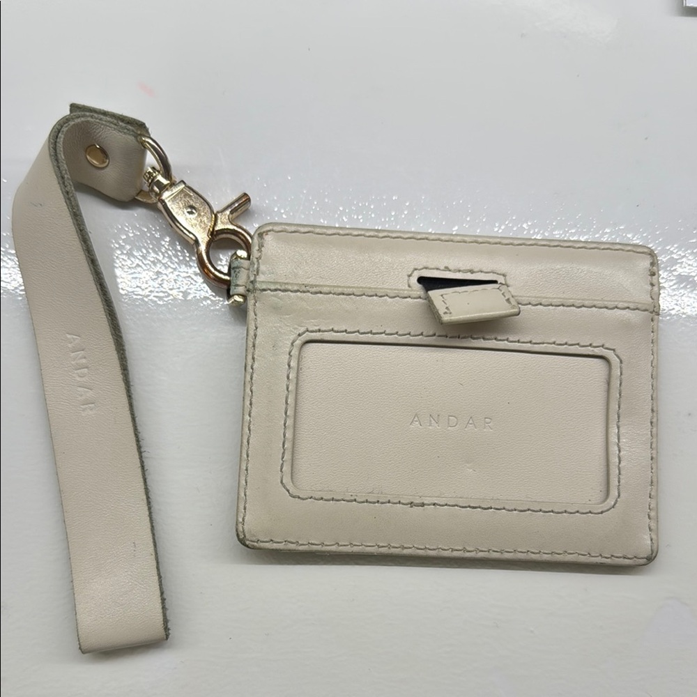 Andar Cream Wristlet Clutch